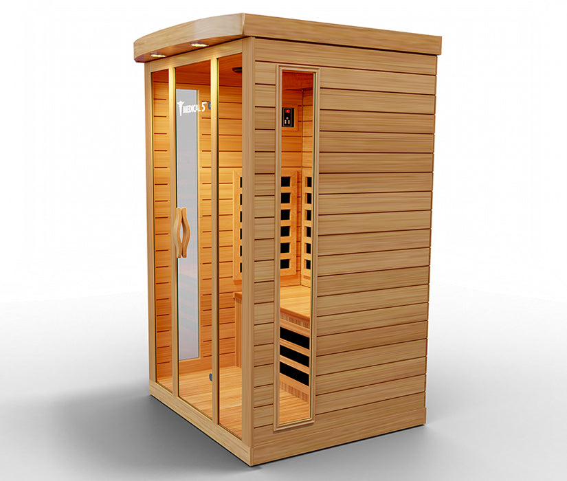 Side view of a wooden sauna with glass door set on a white background