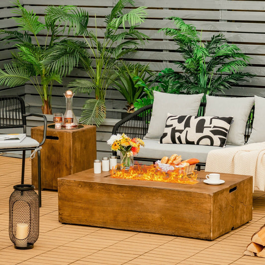 Outdoor patio setting with a fire pit, seating area, and decorative elements.