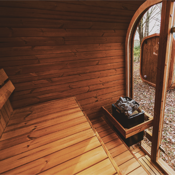 Inner view of wooden sauna showing the rock heater option